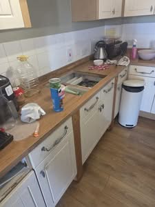 Kitchen prepared for electric hob installation in Raynes Park by BuildSpark